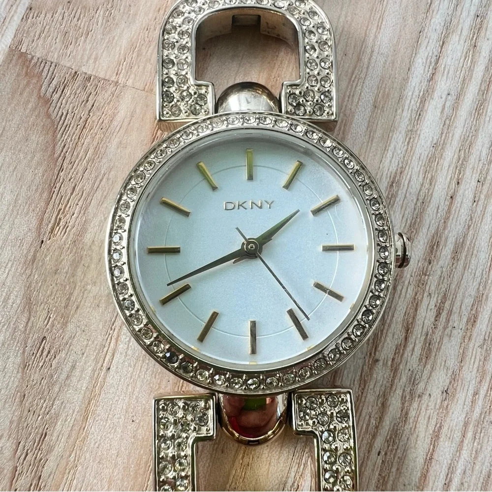 DKNY ladies gold tone crystal studded bracelet watch NEW BATTERY